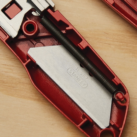 Closeup of Self retracting safety utility knife.