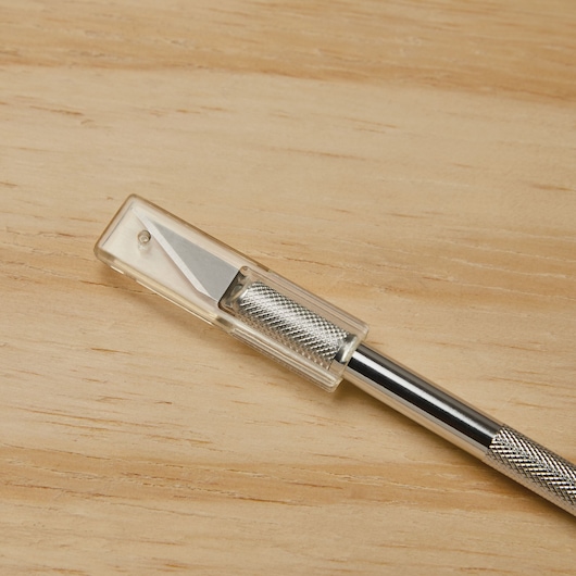 Safety cap feature of 5 inch Hobby knife.