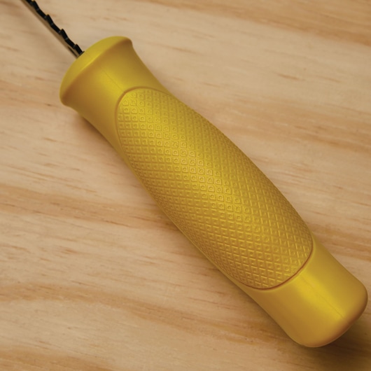 Comfortable grip handle feature of a 6 inch cushion grip wallboard saw.