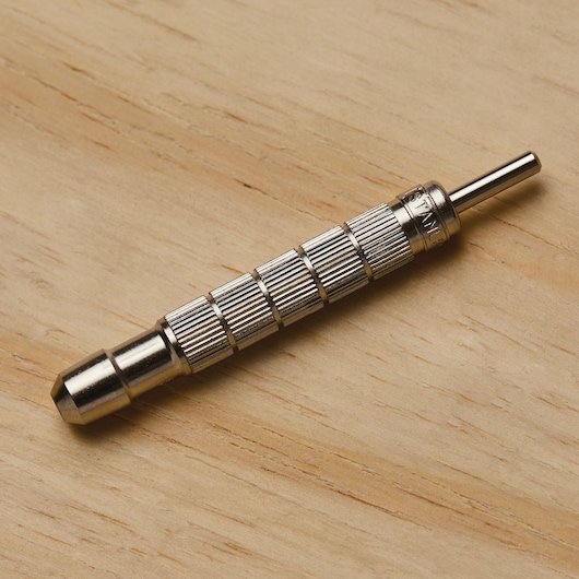 Nickel plated feature of 3 eighth inch self centering screw hole punch