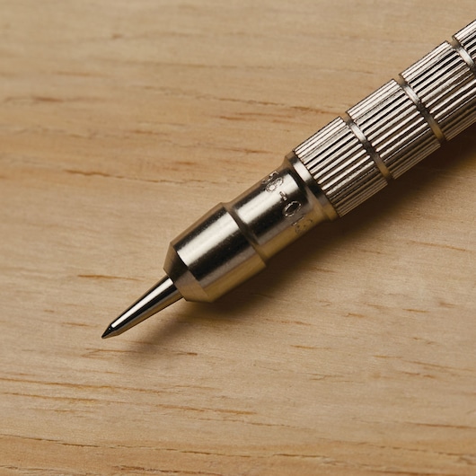 Self centering feature of 3 eighth inch self centering screw hole punch