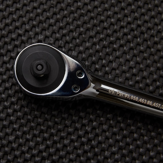 Quick release mechanism to lock sockets onto the drive feature of three eighths inch Drive Rotator Ratchet.