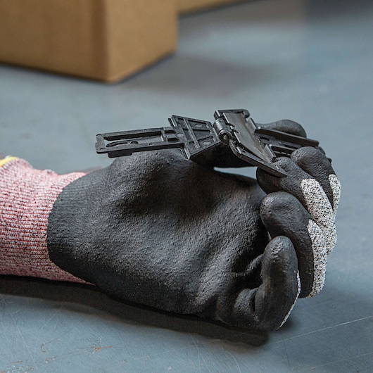 Fatmax double sided pull cutter replaceable blade head in a person's hand.