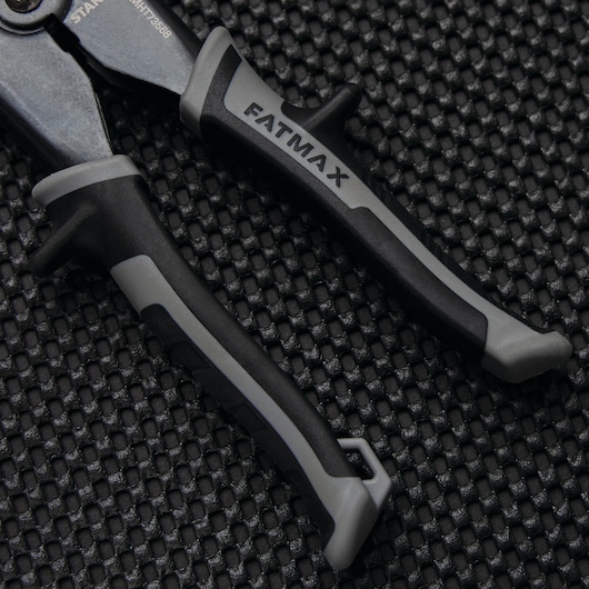 Slip resistant bi metal handle feature in fatmax snip crimper.