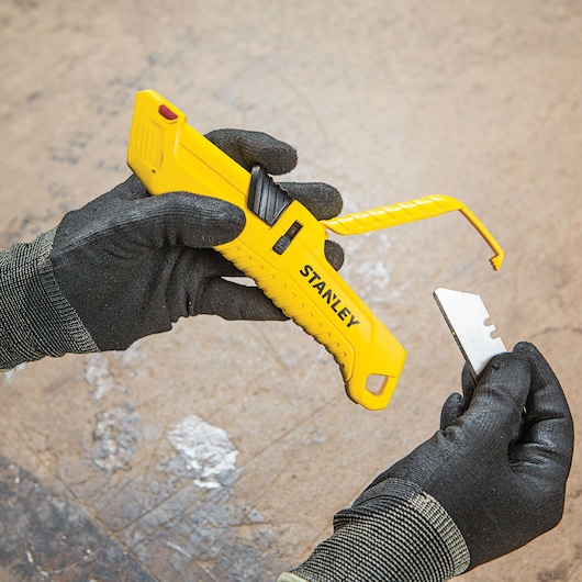 Tri Slide Safety Knife storage box being opened.