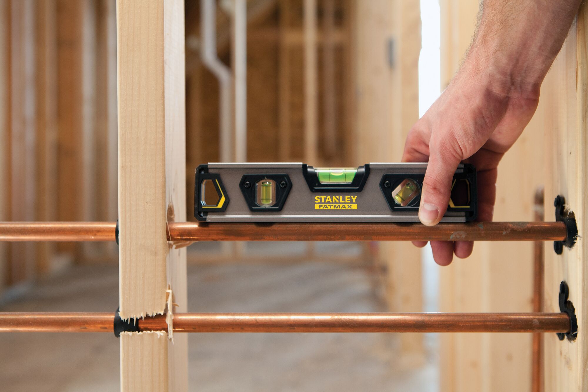 9 inch fatmax torpedo level being used.