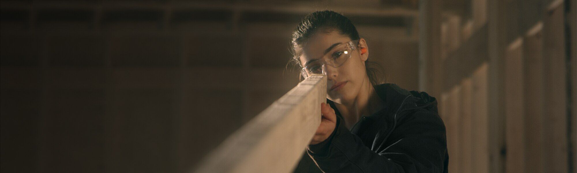 Woodworker build and measure materials.